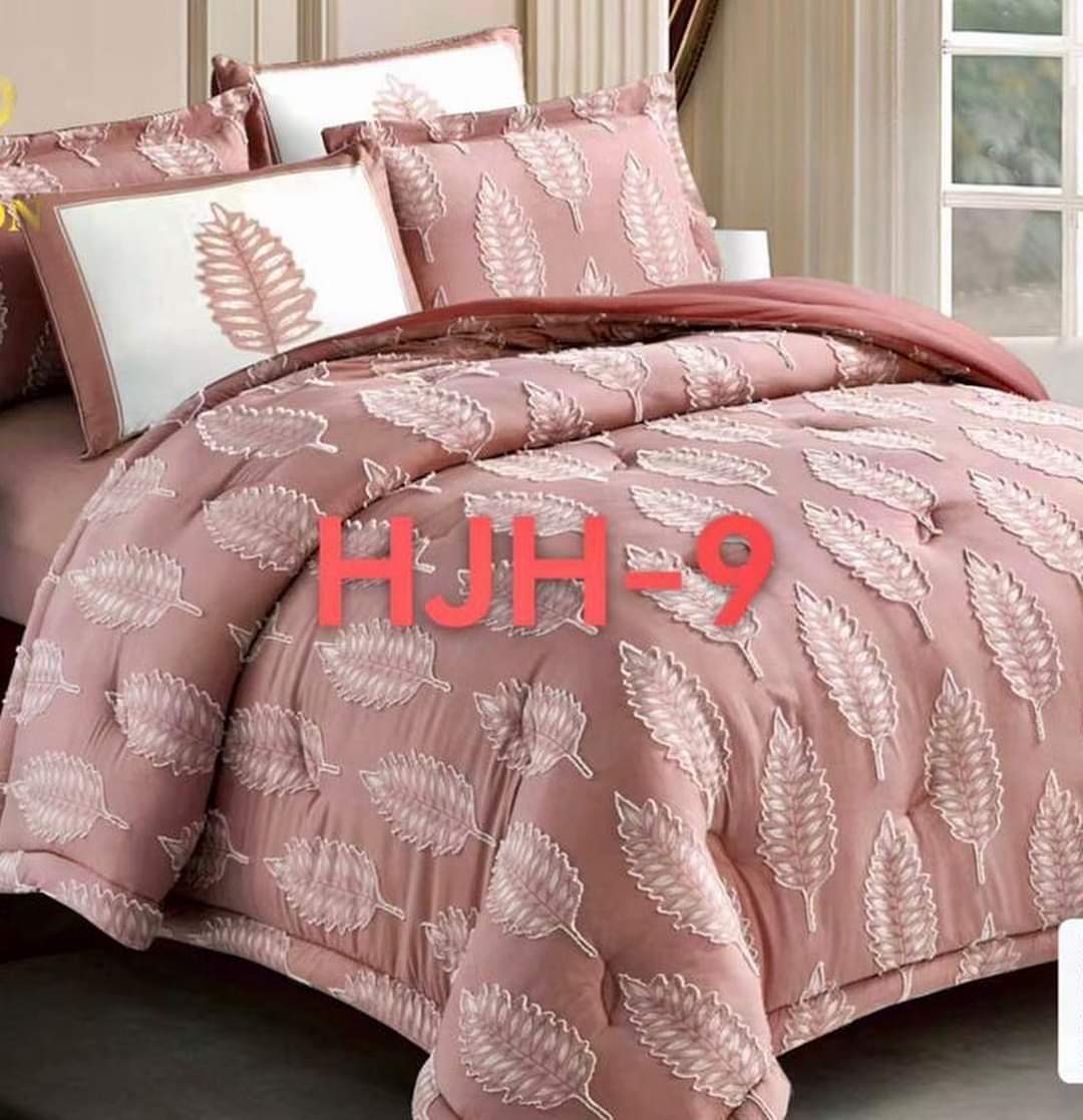 DUVET COVERS WITH 4 PILLOW CASES AND A BEDSHEET 