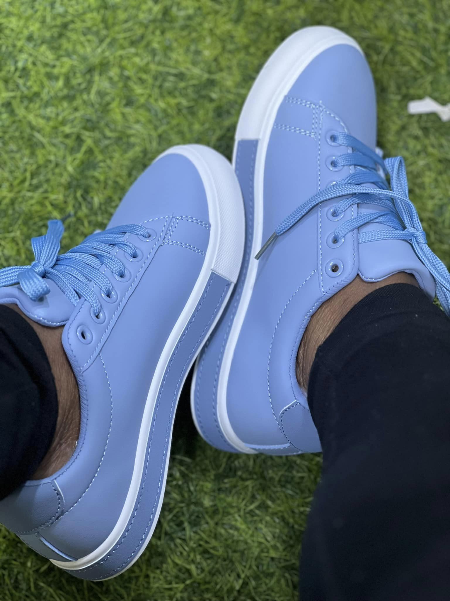 women sky blue sneakers