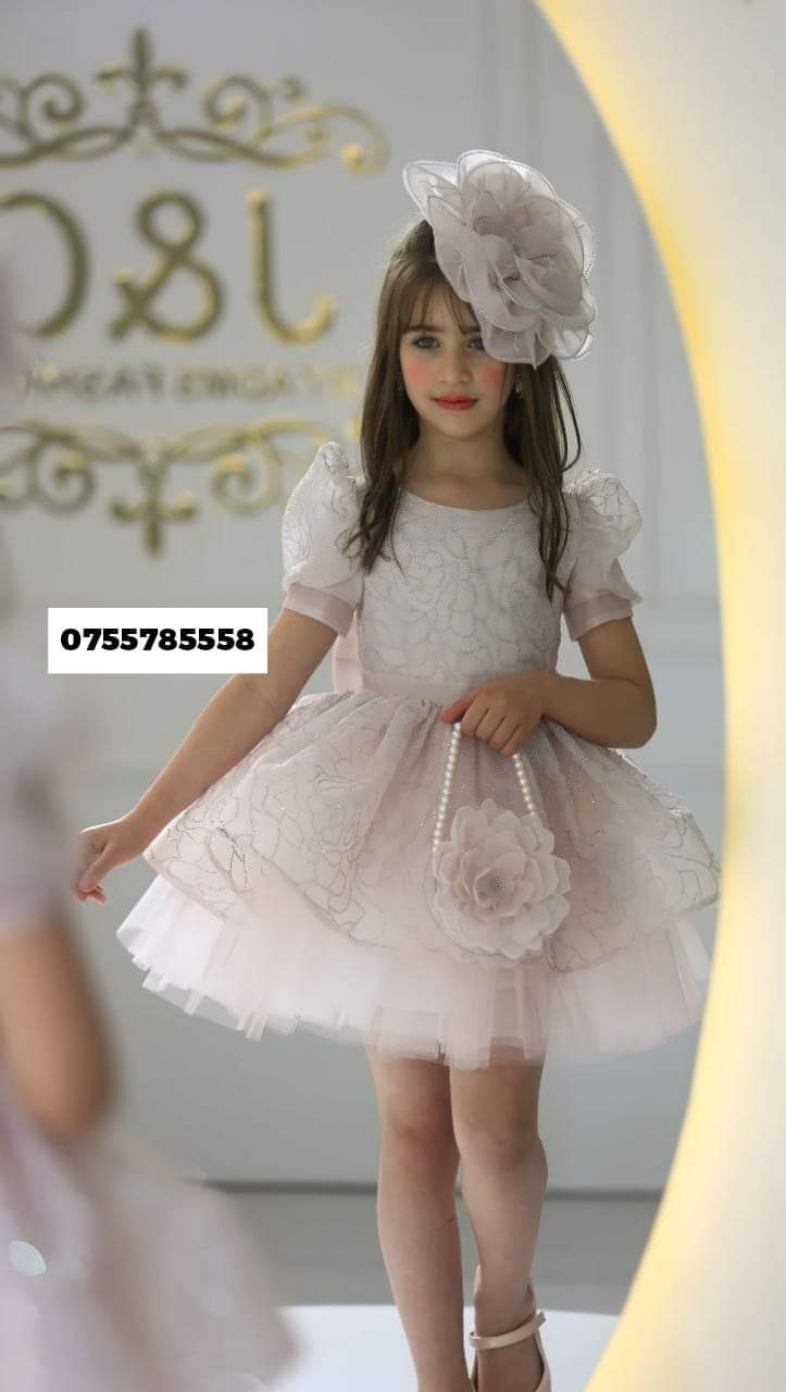 Girls party dresses with fascinator 