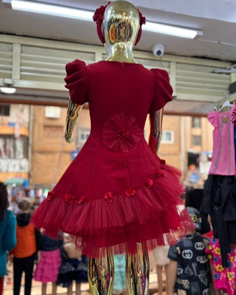 Girls deep red dress with a bag