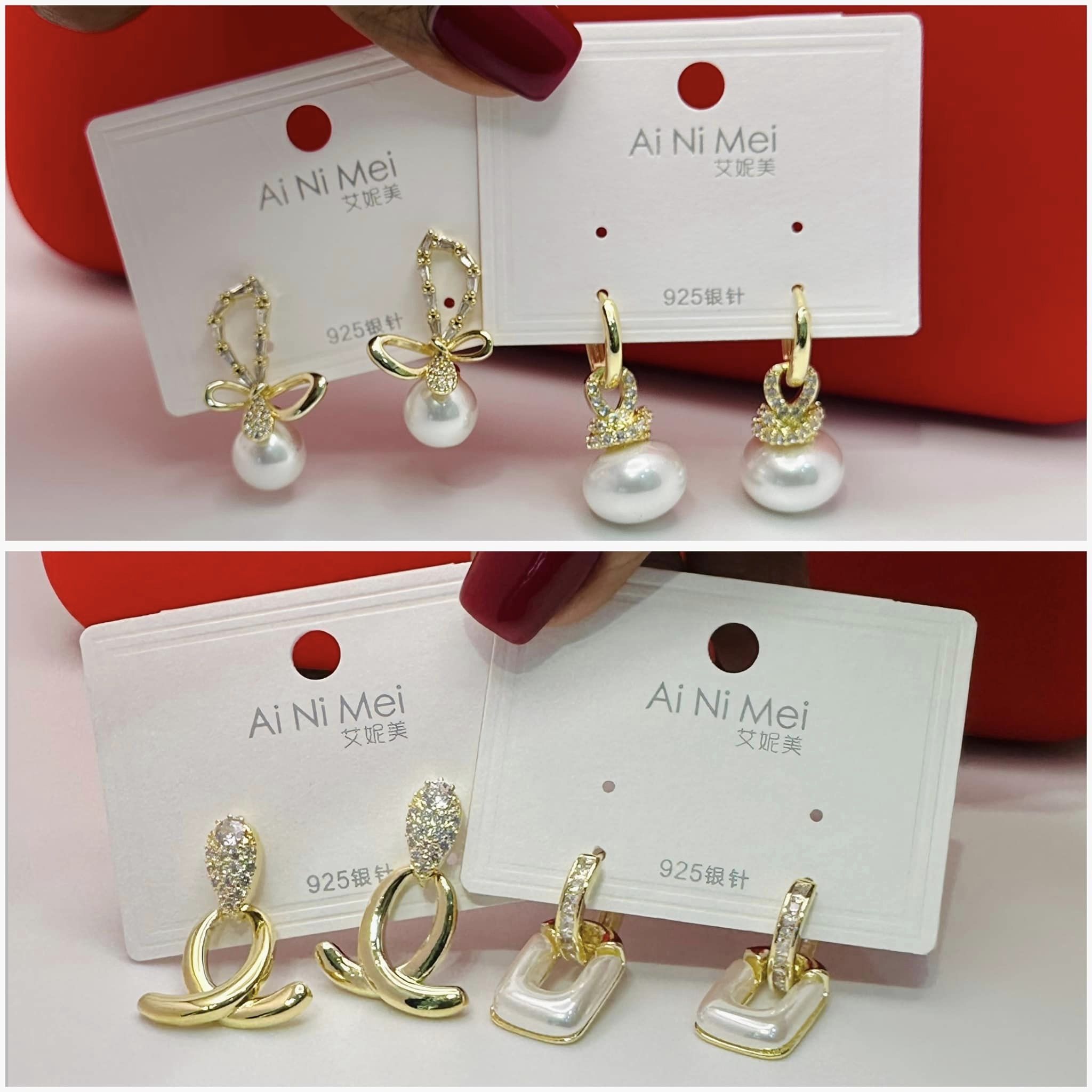 silver and golden earrings