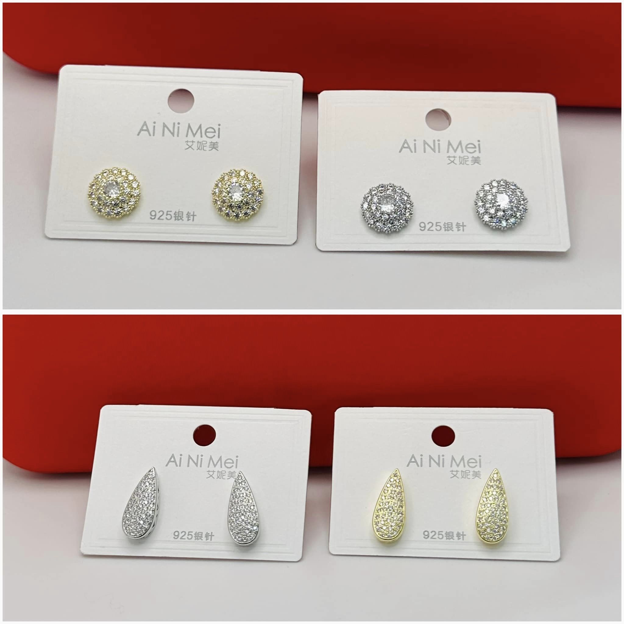 silver and golden earrings