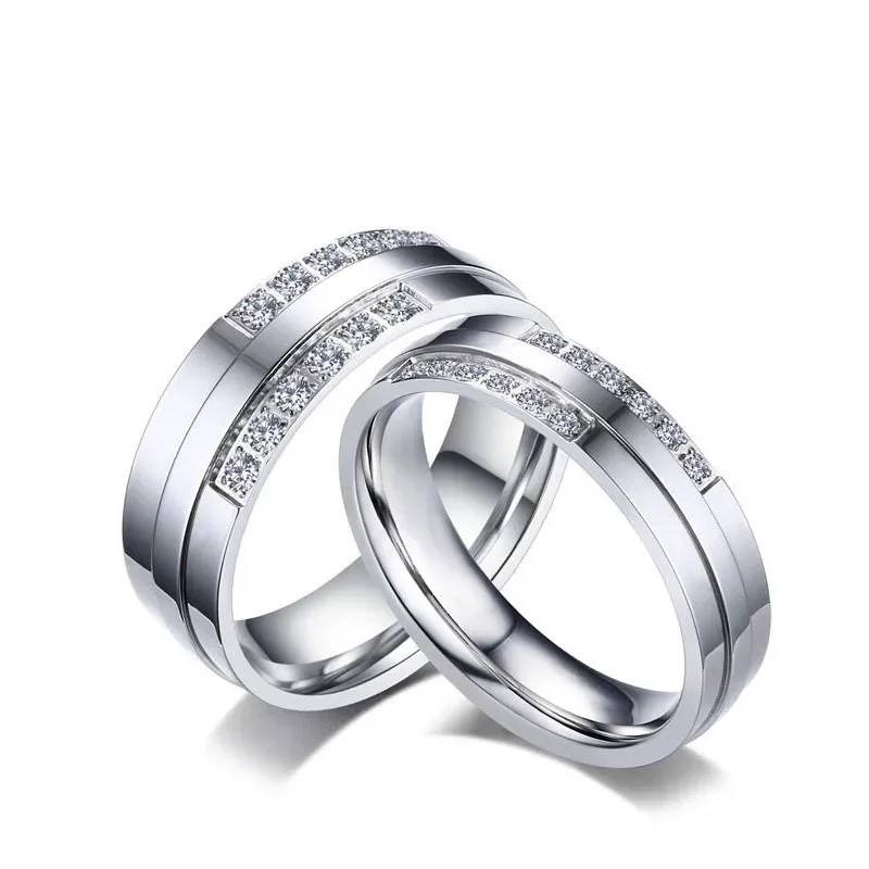 Couple silver CZ stones wedding rings