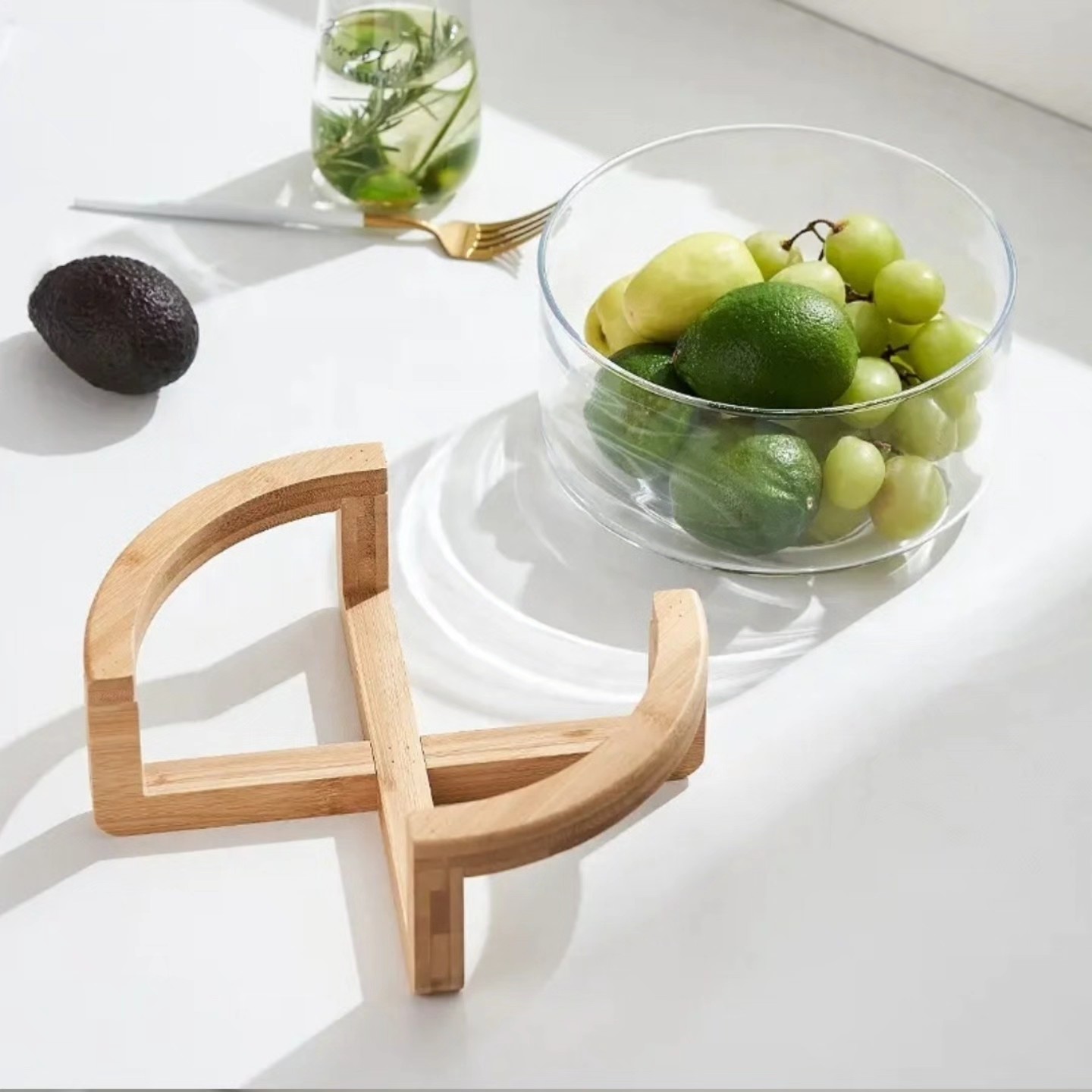 set of 3 Borosillicate salad-serving dishes with a wooden base.