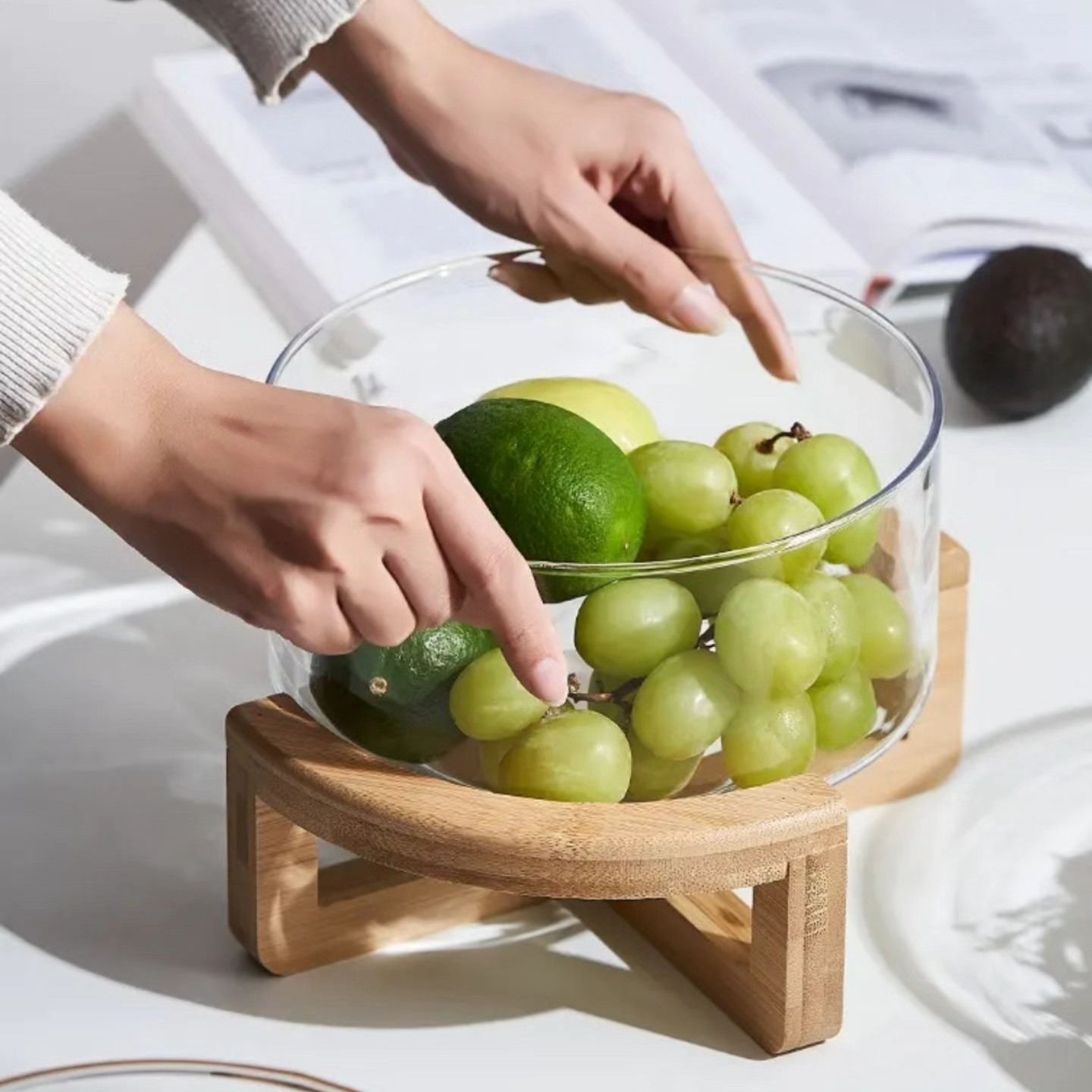 set of 3 Borosillicate salad-serving dishes with a wooden base.